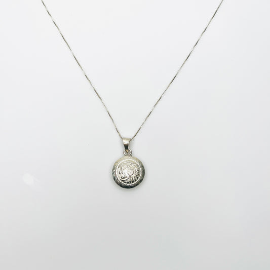 1960s silver Aztec pendant necklace with round Tonatiuh sun god design