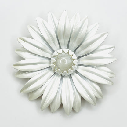 Large vintage white enamel daisy brooch with layered pointed petals and a clear domed Lucite center.