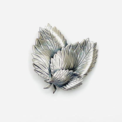 Vintage 1960s silver tone three leaf brooch with etched botanical details