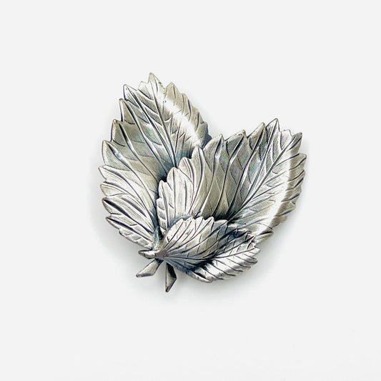 Vintage 1960s silver tone three leaf brooch with etched botanical details