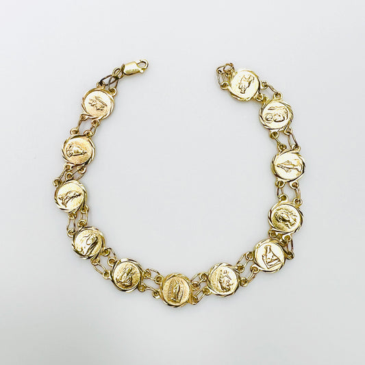 Vintage 14K yellow gold Catholic saints medal panel bracelet with religious motifs