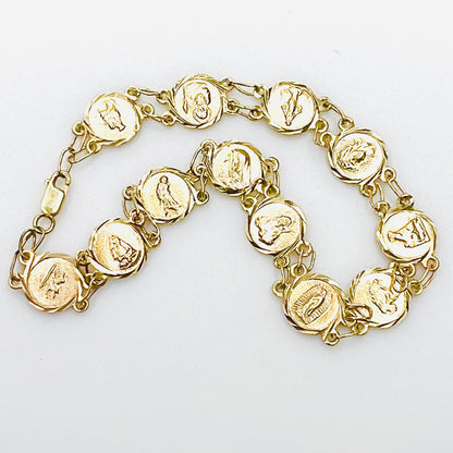 Vintage 14K yellow gold Catholic saints medal panel bracelet with religious motifs