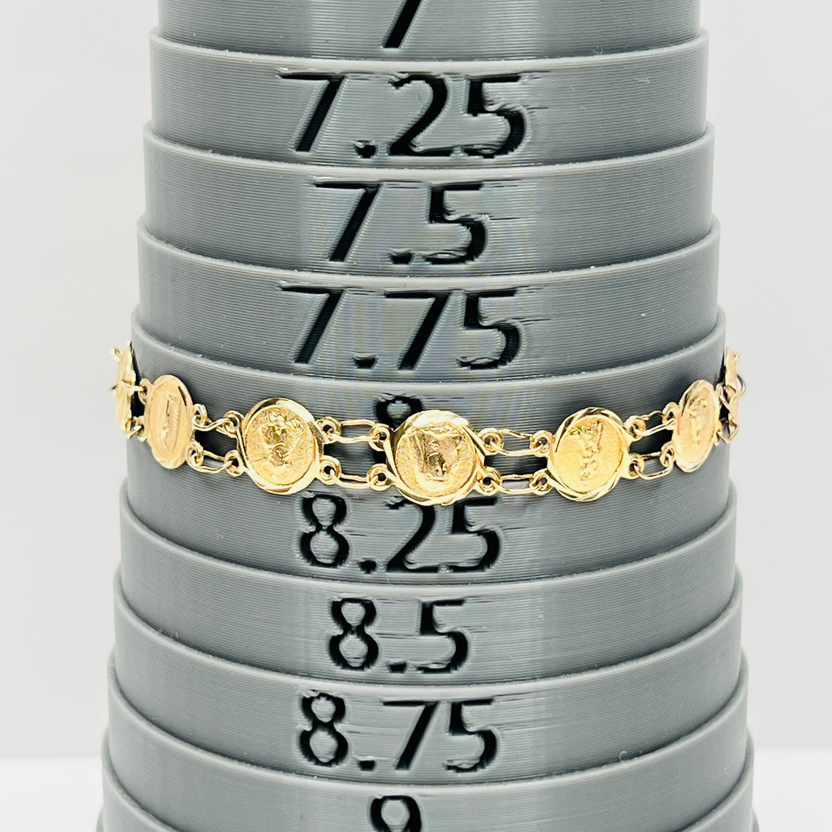 Vintage 14K gold Catholic saints medal bracelet measuring approximately 8 inches