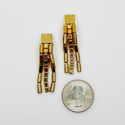 Long geometric gold tone clip on earrings with chain detail size
