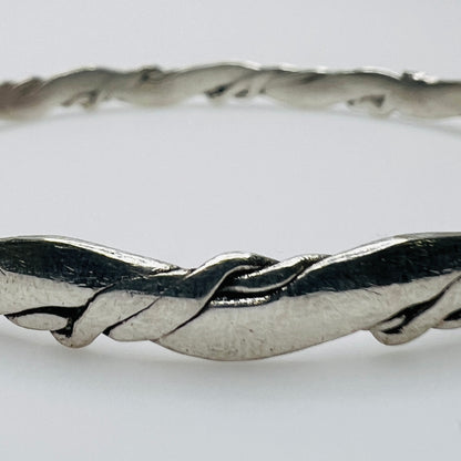 Close-up of twisted sterling silver bracelet detail