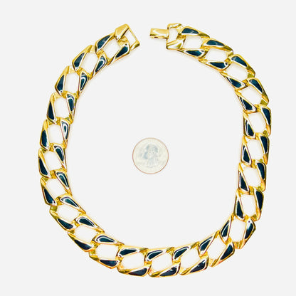 1980s gold tone black enamel statement link necklace shown beside quarter for scale.
