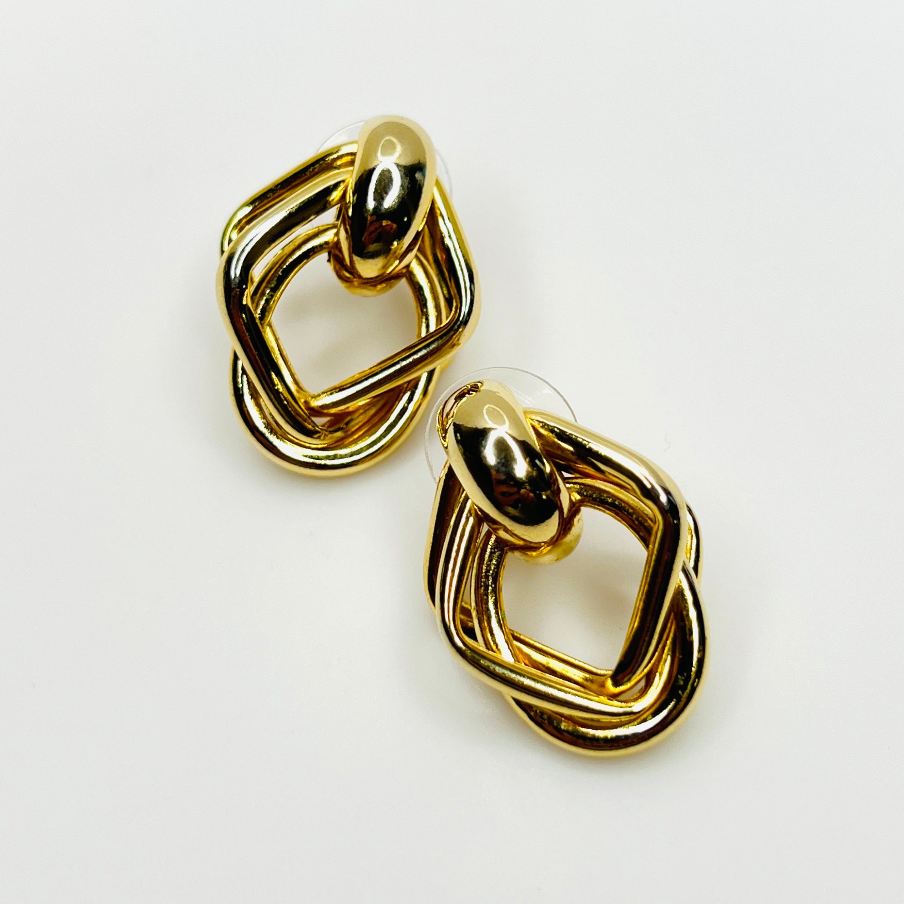 Vintage 1980s gold tone geometric door knocker style stud earrings
