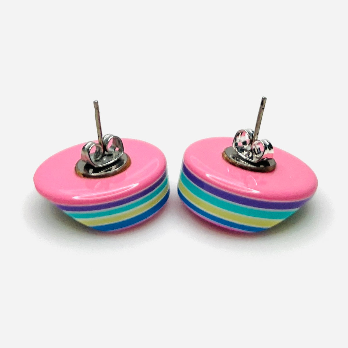 Back view of vintage 1980s resin stud earrings with butterfly backs