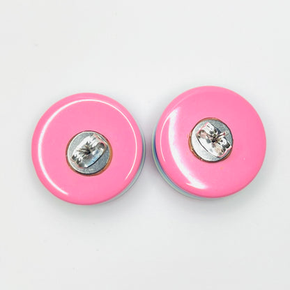 Back view of vintage 1980s resin stud earrings with butterfly backs