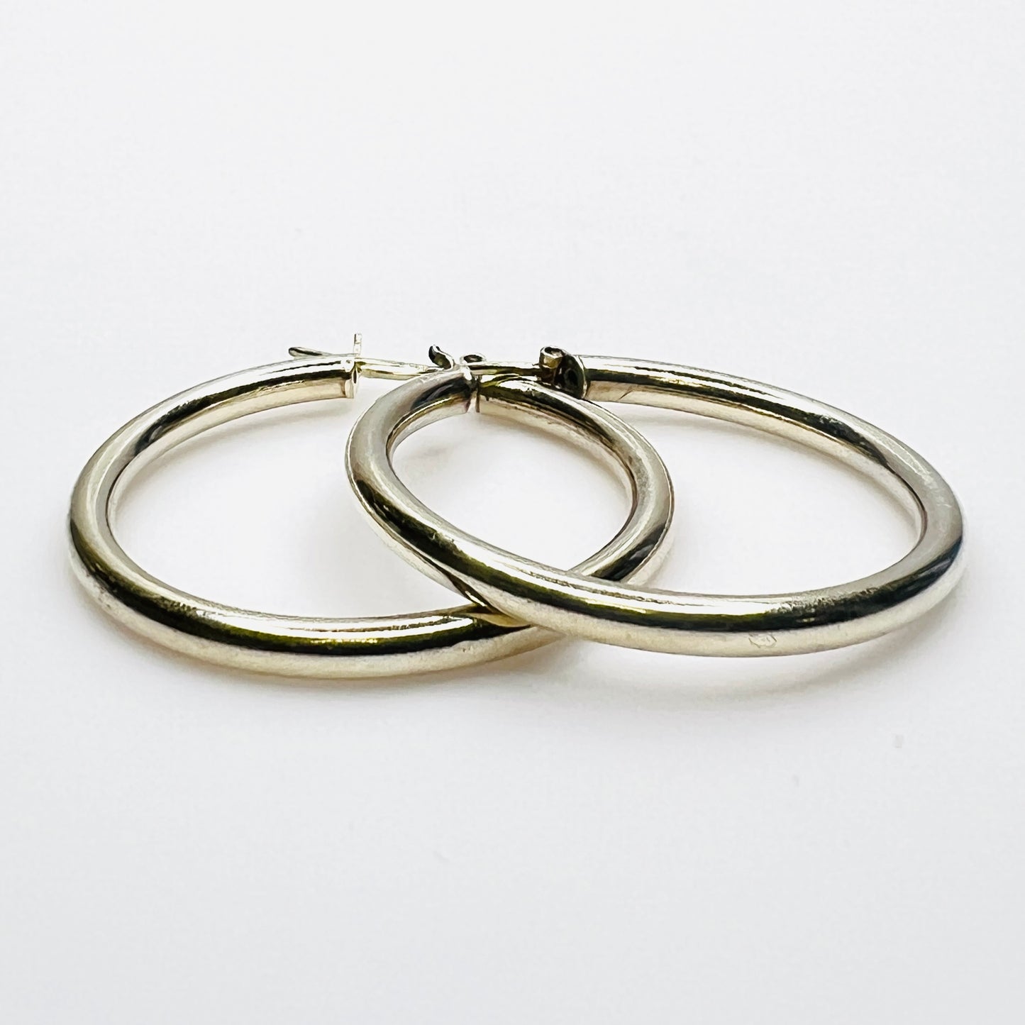 Vintage Italian sterling silver hoop earrings with hinged post closures