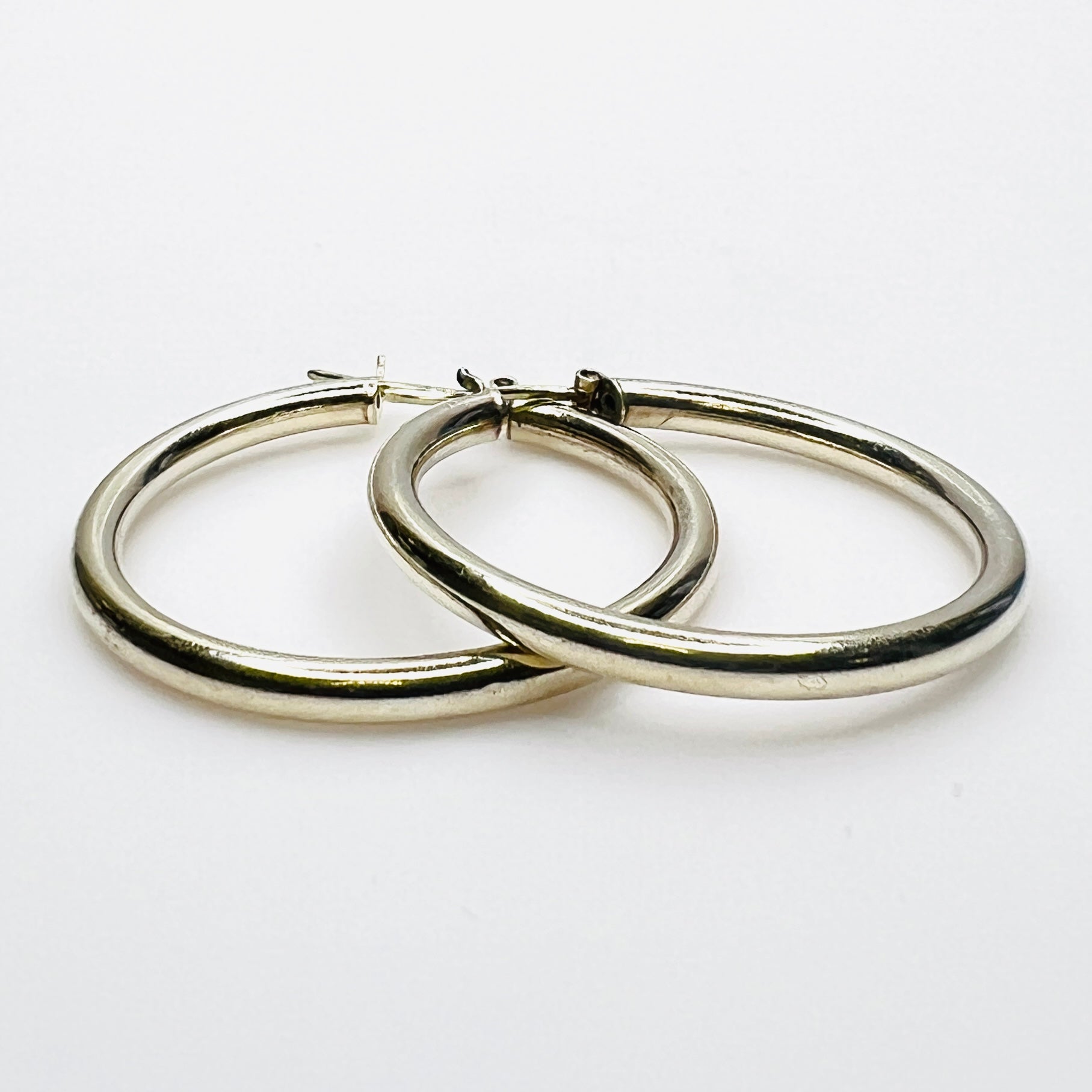 Vintage Italian sterling silver hoop earrings with hinged post closures