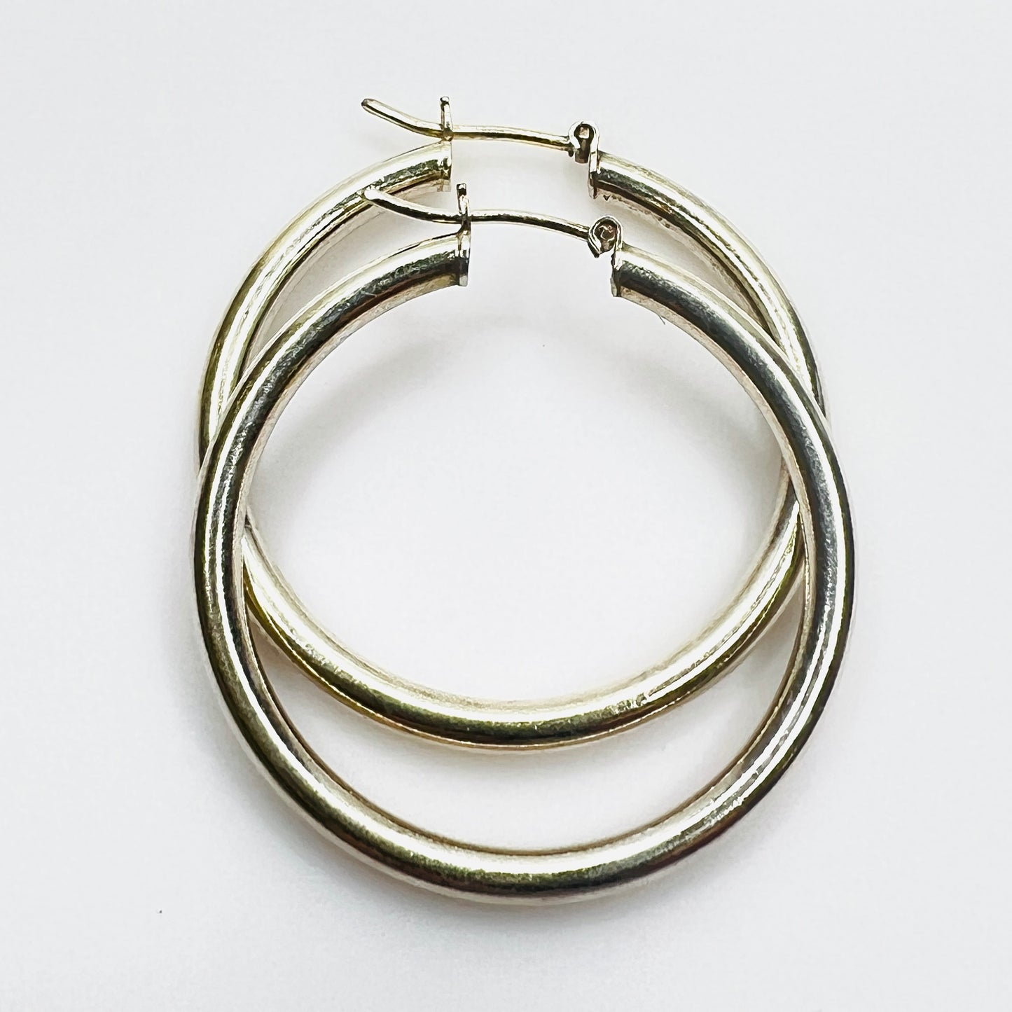 Vintage Italian sterling silver hoop earrings with hinged post closures