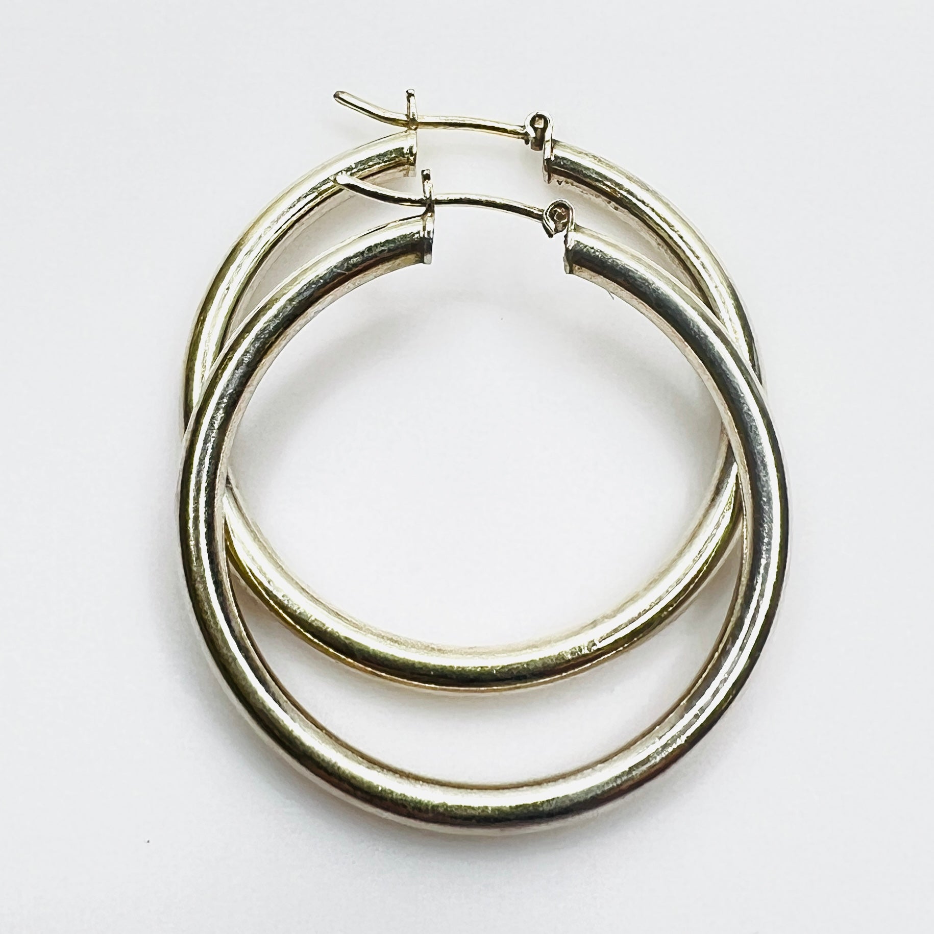 Vintage Italian sterling silver hoop earrings with hinged post closures