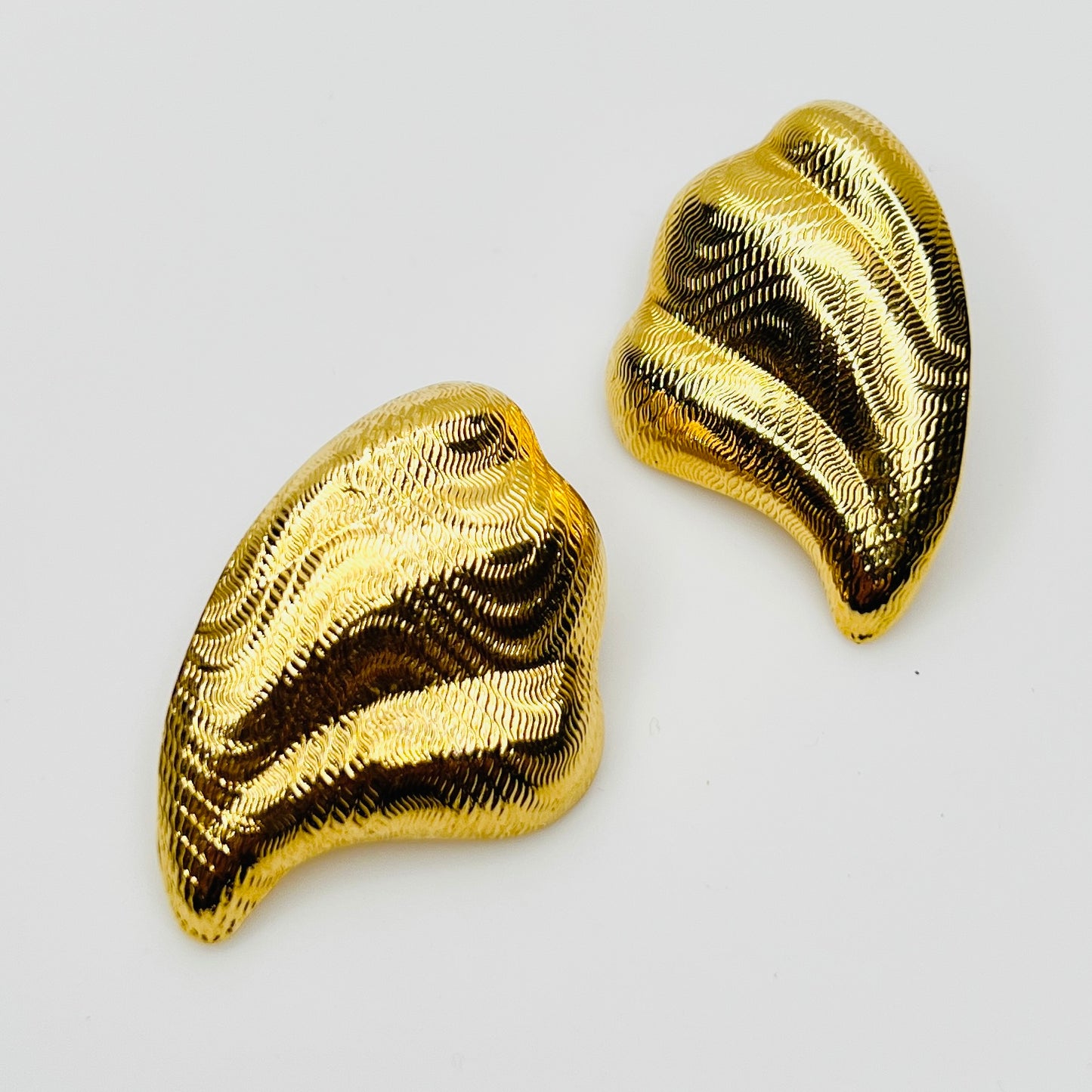 Vintage 1980s textured gold wave statement stud earrings