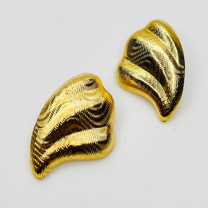 Vintage 1980s textured gold wave statement stud earrings
