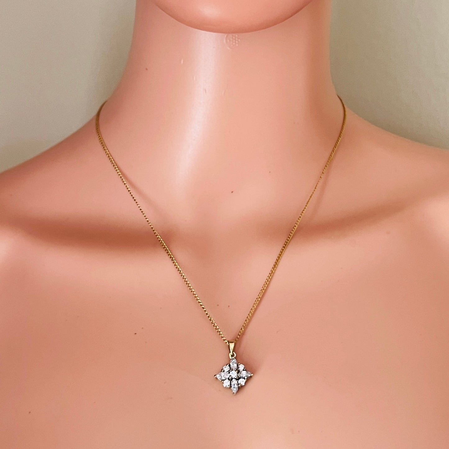 Crystal cluster star pendant necklace worn on neckline vintage style