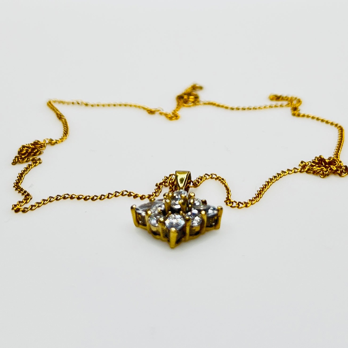 Side view prong set crystal pendant gold vermeil necklace