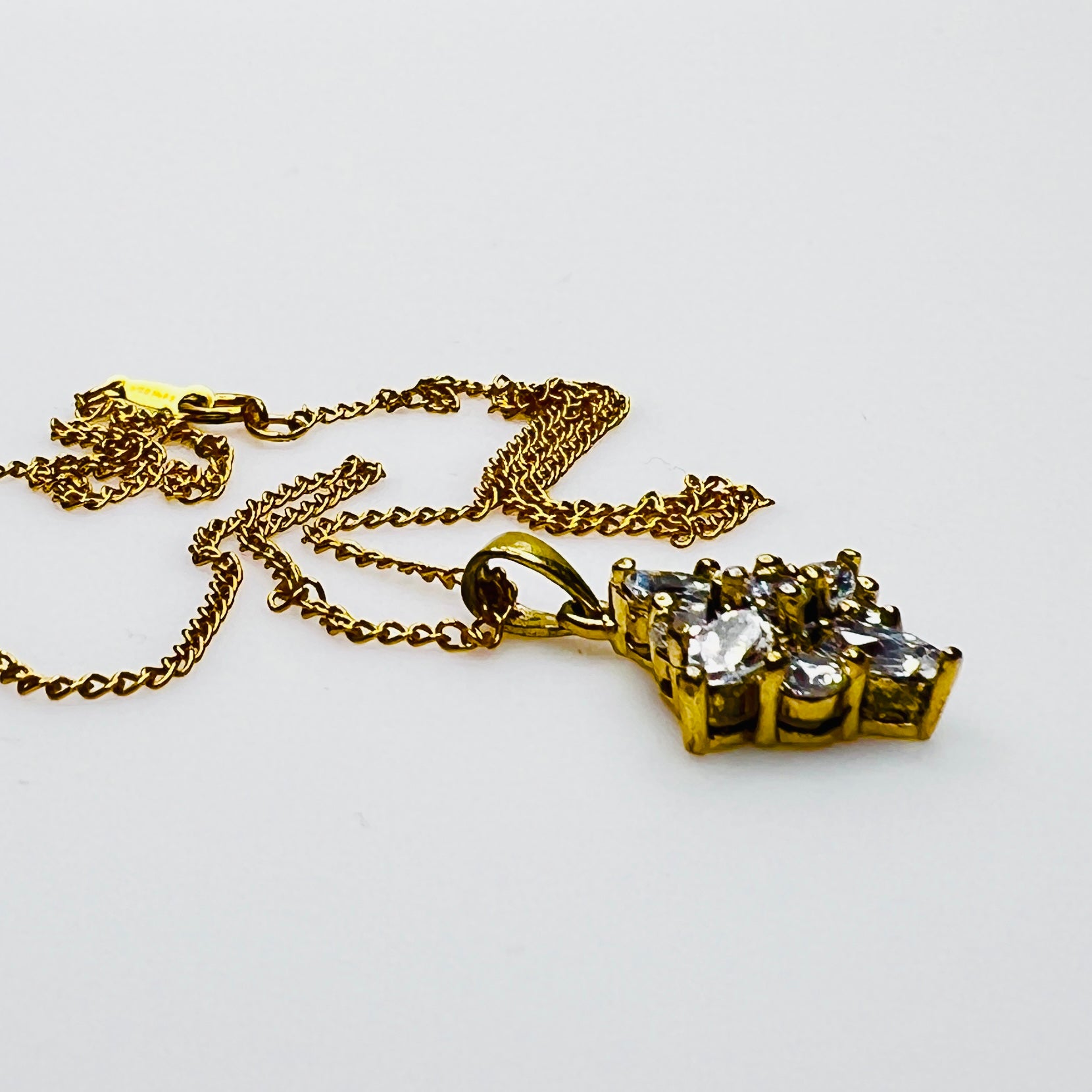 Side view prong set crystal pendant gold vermeil necklace