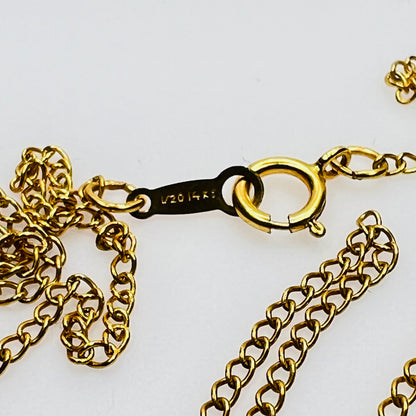 Close-up 14K stamped clasp vintage gold chain necklace