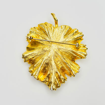 Reverse of signed BSK botanical brooch