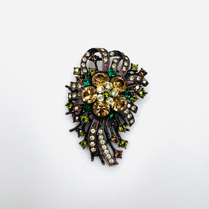 Vintage Joan Rivers floral brooch with amber, green and champagne glass rhinestones