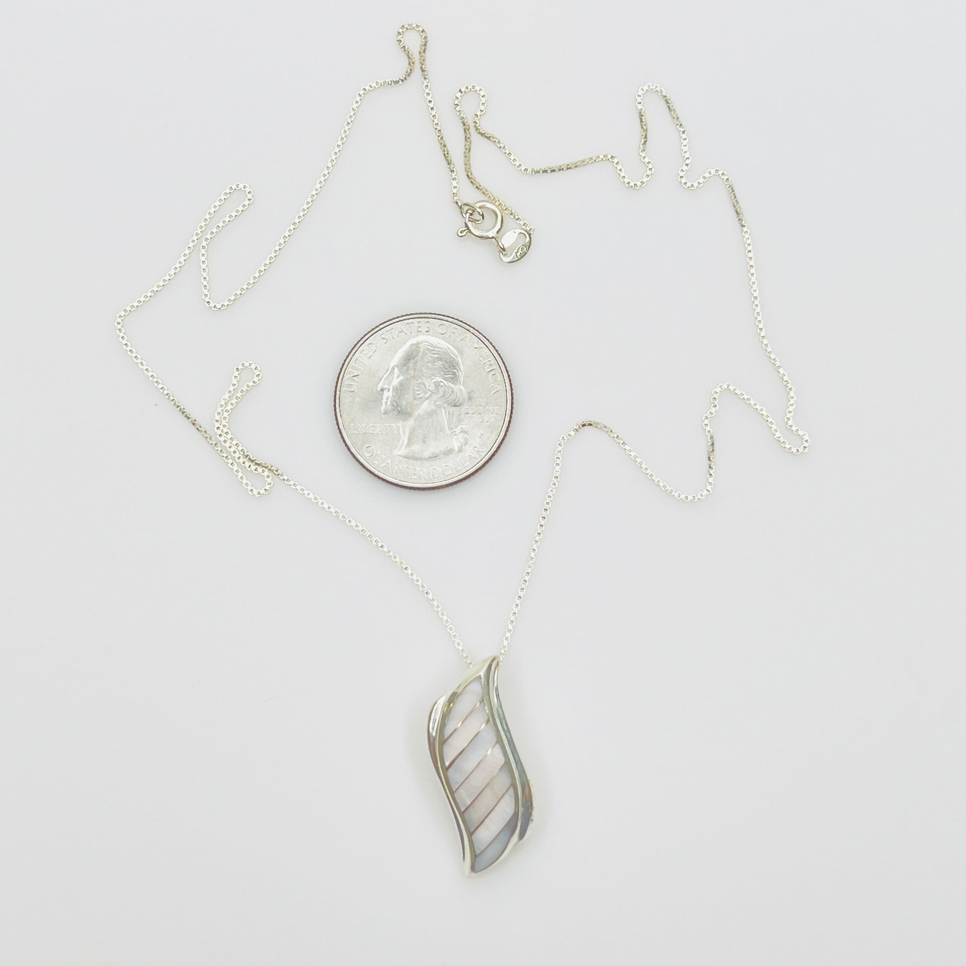 Vintage silver pendant with iridescent shell inlay curved design