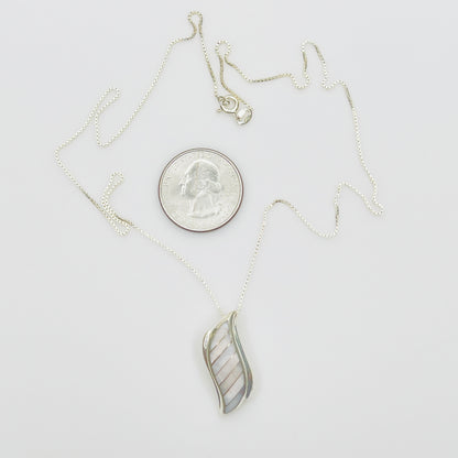 Vintage silver pendant with iridescent shell inlay curved design
