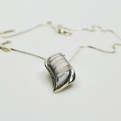 Side view sterling silver wave pendant mother of pearl detail