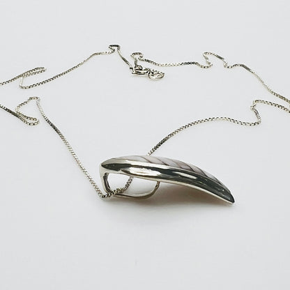 Side view sterling silver wave pendant mother of pearl detail