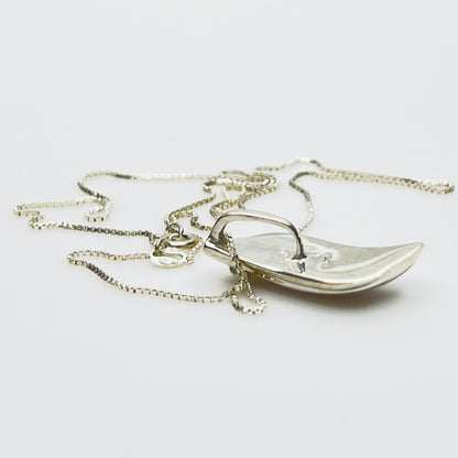 Side view sterling silver wave pendant mother of pearl detail