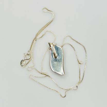 Back view sterling silver wave pendant mother of pearl detail