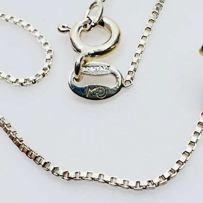 Close-up sterling silver chain clasp marked 925 Italy