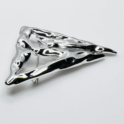 Side profile of vintage Torino abstract geometric brooch showing dimensional sculptural form.
