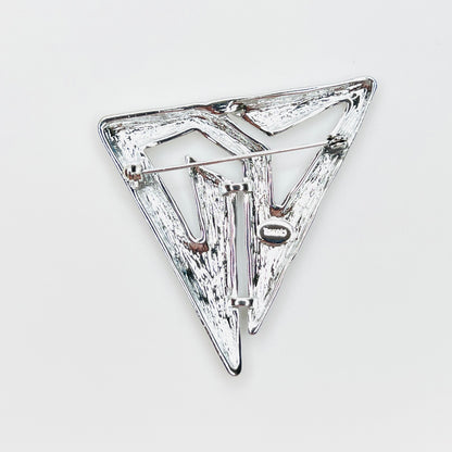 Reverse of signed Torino silver-tone Modernist brooch with secure pin clasp.