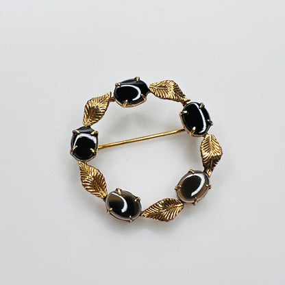 Vintage gold leaf circle brooch with black cabochons WRE 1950s