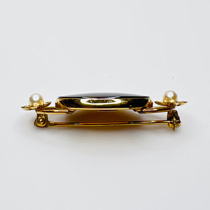 Side view gold filled brooch with raised onyx setting