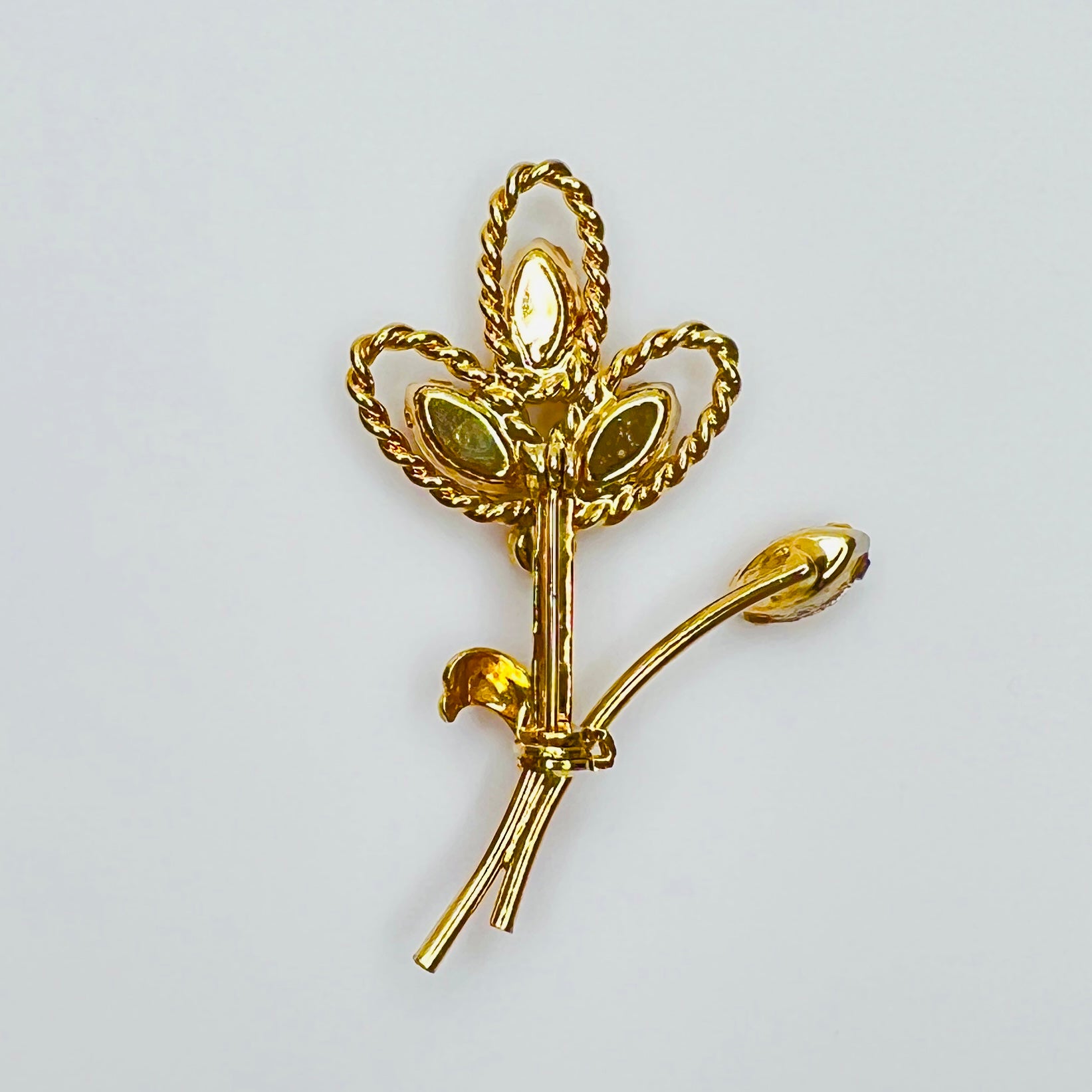 Reverse of vintage gold tone floral brooch