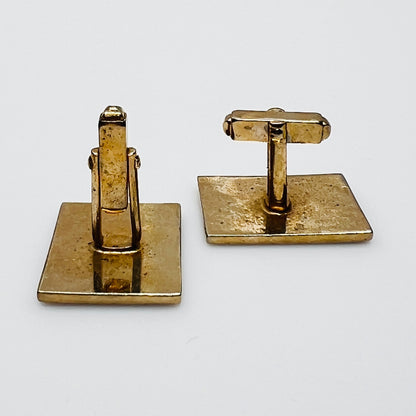 Close-up Egyptian revival mosaic eye enamel cufflinks