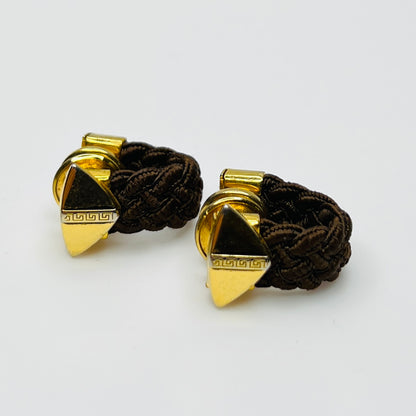 Vintage gold tone cufflinks with braided wrap and triangle Art Deco design