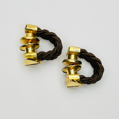 Side view braided wrap cufflinks gold tone geometric design