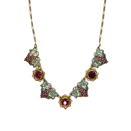 Vintage artisan enamel grape necklace with ruby red rhinestones and gold tone chain.