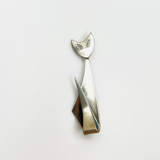 Vintage signed Kim stainless steel Modernist cat brooch with sculptural minimalist design.