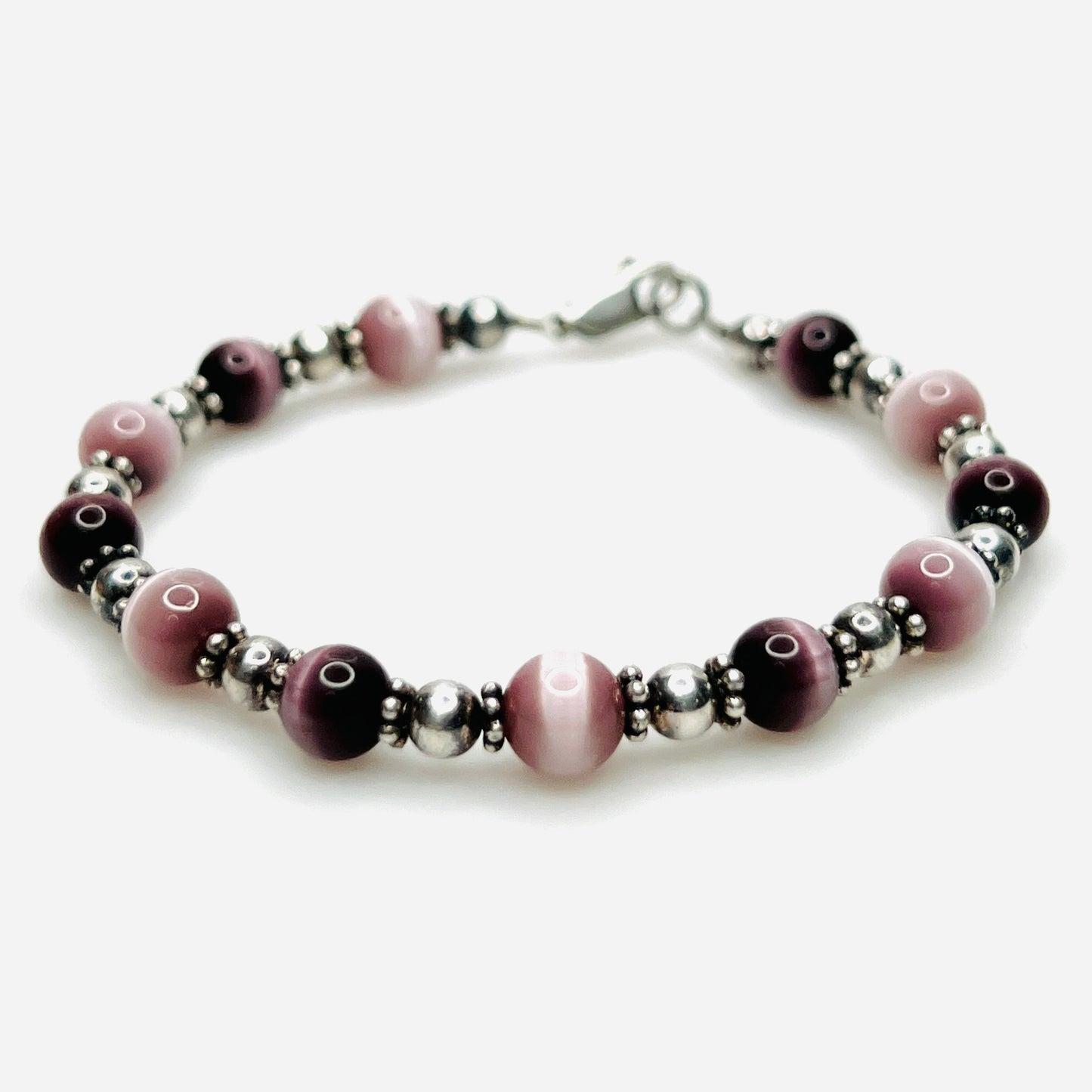 Purple cat's eye and sterling silver vintage bracelet with lobster clasp
