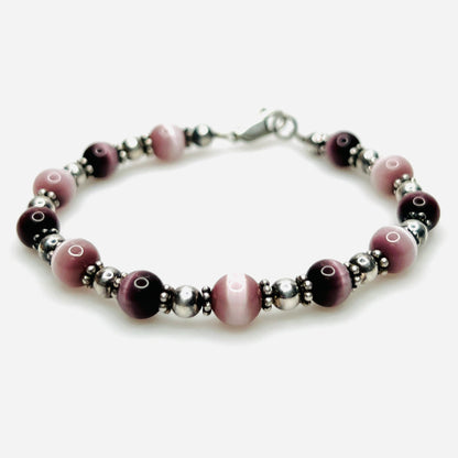 Purple cat's eye and sterling silver vintage bracelet with lobster clasp