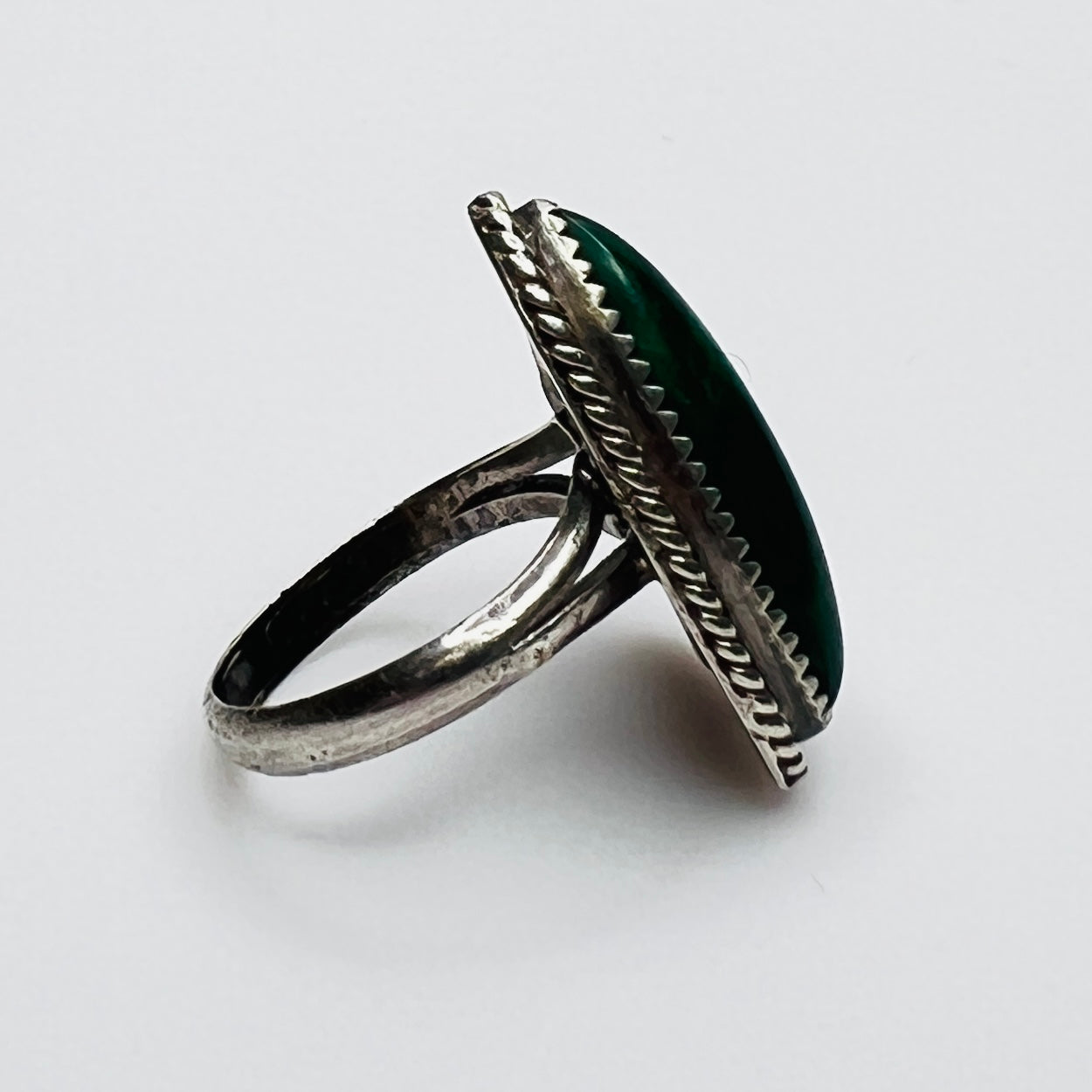 Side view of sterling silver malachite ring with leaf detail
