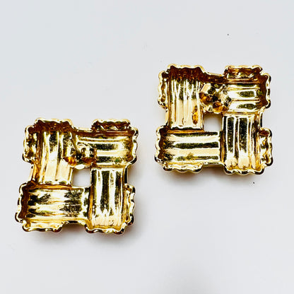Back view of signed Avon gold tone basket weave earrings