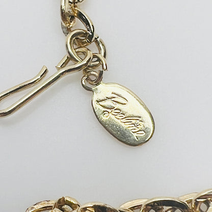 Beeline hang tag and clasp detail on gold tone chain