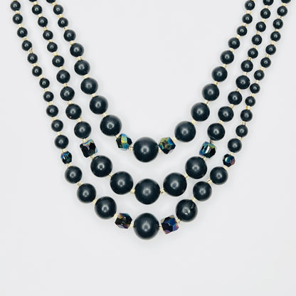 Vintage multi strand black bead necklace with aurora borealis accents