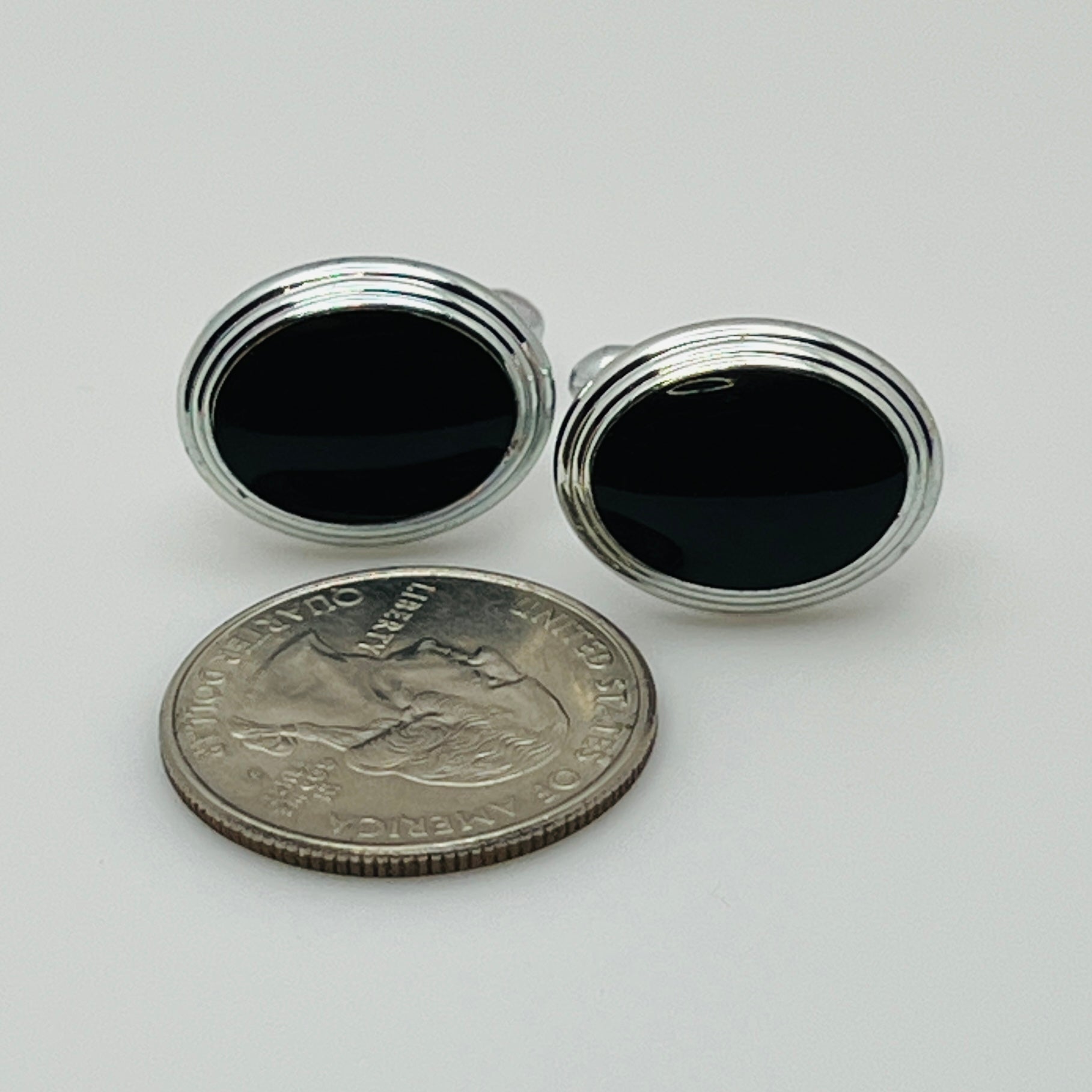 Vintage silver oval cufflinks with black resin center