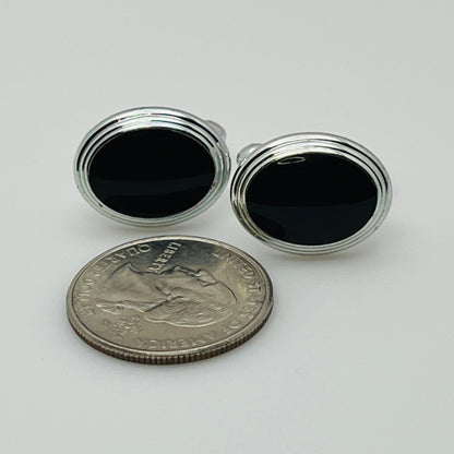 Vintage silver oval cufflinks with black resin center